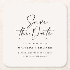 the save the date card is shown in black ink on a white square paper background