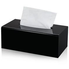 a black tissue dispenser with a white napkin on it