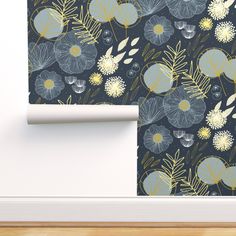 a wallpaper with blue and yellow flowers on it