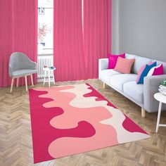 a living room filled with furniture and pink curtains