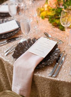 a table set with silverware and place settings for an elegant wedding reception at the four seasons resort