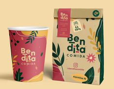 a coffee cup next to a paper bag with the word ben dita comida on it