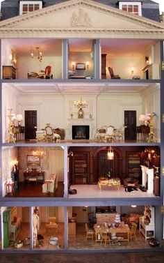 the inside of a doll house with furniture