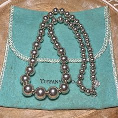 Tiffany & Co. Hardwear Graduated Ball Necklace. Good Condition - Has Some Fine Scratches On The Balls From Normal Wear. The Dust Bag Has Some Markings On It. Tiffany Hardwear Is Elegantly Subversive And Captures The Spirit Of The Women Of New York City. This Necklace Features A String Of Sterling Silver Spheres In A Variety Of Sizes. 925 Sterling Silver Dust Bag Included Tiffany Hardwear, Ball Necklace, Fine Jewellery Necklace, The Spirit, Tiffany & Co., Womens Jewelry Necklace, Jewelry Necklace Pendant, York City, New York City