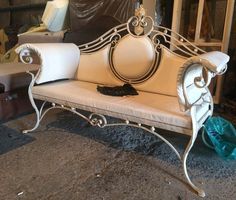 a white bench sitting on top of a carpeted floor