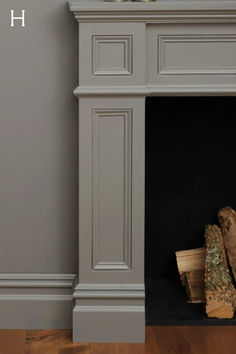 an empty fireplace with wood logs in front of it and the words how to paint a fireplace