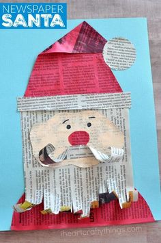 a paper santa hat on top of a piece of newspaper with the words news paper santa