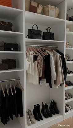 an organized closet with shoes, handbags and purses on the shelves next to each other