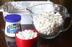 the ingredients to make marshmallows are displayed in bowls