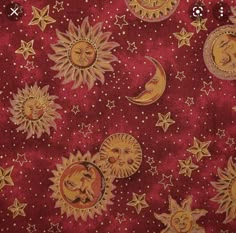 a red background with sun and moon designs on the fabric, as well as stars