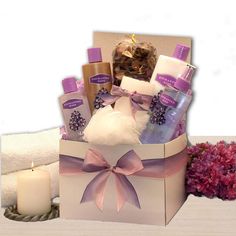 a gift box with candles, soaps and other items for someone's special occasion