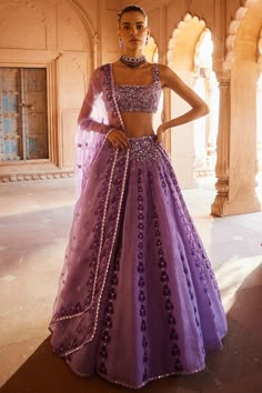 Featuring a purple lehenga in organza base with thread, sequins and mirror work, including hand block print. It is paired with a matching net embellished blouse and a dupatta. . #perniaspopupshop #whatiworewastrending #ppuslove #lehengaset #indianattire #ethnic Lehenga Belt, Indian Wedding Dress Traditional, Lavender Lehenga, Purple Lehenga, Cultural Clothes, Ethereal Elegance, Saree Blouse Styles, Vacuum Storage