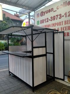 an outdoor kiosk that has been built into the ground