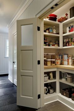 an open pantry with lots of food in it