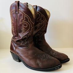 Vintage Boulet Brown Leather Western Cowboy Boots Embroidered Handmade Canada Rockabilly size 10.5 Leather sole, lined with leather and a Goodyear welt. Please view pictures as part of the description, all vintage items are final sale. Please visit my other vintage collectibles in my shop : https://www.etsy.com/ca/shop/Sewfunky?ref=shop_sugg§ion_id=31004548 Retro Fitted Boots For Rodeo, Retro Leather Boots With Snip Toe, Vintage Leather Boots For Rodeo, Retro Snip Toe Boots For Rodeo, Vintage Brown Retro Snip Toe Boots, Retro Leather Boots For Rodeo, Vintage Rodeo Boots With Round Toe, Vintage Round Toe Rodeo Boots, Vintage Round Toe Boots For Rodeo