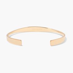 Declare your bold style with the Whitney Cuff Bracelet. Crafted of warm gold, its sleek silhouette is personalized with an engraved name of your choice. Show the world who you are in a luxurious way you can feel proud of. Will it be yours? Available in 14k gold plated brass Width: 1/4" Length: 6" With engraving this item is FINAL SALE SKU: BYB1108 Classic Adjustable Open Cuff Bracelet, Minimalist Personalized Bracelet For Formal Occasions, Modern Engraved Rose Gold Bracelets, Modern Formal Name Bangle Bracelet, Classic Adjustable Name Bracelet With Polished Finish, Modern Bangle Name Bracelet For Everyday, Modern Adjustable Cuff Bracelet With Shiny Finish, Modern Adjustable Shiny Cuff Bracelet, Minimalist Engraved Bangle Cuff Bracelet