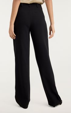 Introducing the ultimate wardrobe staple - the Becca Pant! Made from luxurious drapey crepe, these trousers feature pleated detailing and a wide leg for a flattering and stylish look. Perfect for any occasion, these pants are a must-have for your wardrobe. Details Zipper fly and button closureFabric: Drapey CrepeStraight legDraping detailsFull length Content and Care 69% Triacetate 31% PolyesterDry CleanImported Measurements 34.5in/87.63cm, inseamMeasurements from size 4 Crepe Pants, High Hips, Denim Chic, Parisian Chic, Pants Black, Wardrobe Staples, Black Pants, Full Length, Straight Leg