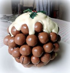 a white plate topped with chocolate covered fruit