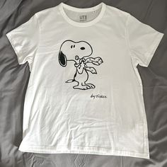 Uniqlo Everyday Peanuts Women’s T-Shirt Snoopy Print Nwot Never Worn/Used Uniqlo Casual Graphic Print T-shirt, Uniqlo Cotton T-shirt Relaxed Fit, Uniqlo Casual Crew Neck T-shirt, Uniqlo Cotton Relaxed Fit T-shirt, Snoopy Print, Uniqlo Shirt, Snoopy Shirt, Uniqlo Tops, White T Shirts