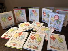 several birthday cards with balloons on them are arranged in a circle and placed next to each other