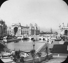 an old black and white photo of a city