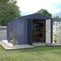 an outdoor storage shed with its doors open and plants in the yard next to it