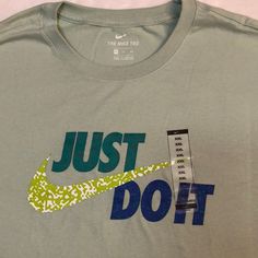 Brand New With Tags Attached Men’s Size Xxl Nike T-Shirt Color Light Green & A Multicolor “Just Do It” Please See All Attached Pictures For Any Additional Details Nike Green Graphic Print T-shirt, Nike Green T-shirt For Streetwear, Nike Green T-shirt With Graphic Print, Nike Green Tops With Graphic Print, Green Sporty Shirt With Logo Print, Sporty Green Shirt With Logo Print, Green Nike T-shirt For Streetwear, Casual Green Nike T-shirt, Graphic Tee Sports Shirt In Green