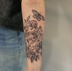 a person with a tattoo on their arm