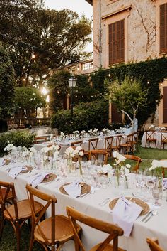 the tables are set outside for an outdoor dinner