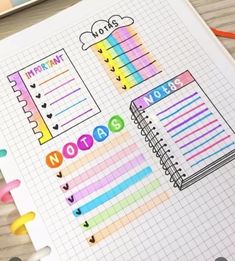 an open notebook with stickers on it next to pencils and paper clipping