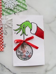 a handmade christmas ornament with the grin on it