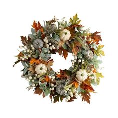 a wreath with leaves and flowers on it