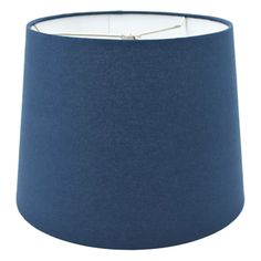 a blue lampshade with a white light in the middle