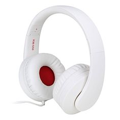 a pair of white headphones sitting on top of each other next to a red button