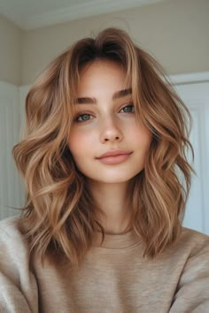 Click for More ➡️ | Save for Later ❤️  A rich caramel latte hue combines with wavy layers for a soft and feminine shag that complements various skin tones. (Caramel Latte Shag with Wavy Layers - Medium Length Shag Haircuts) Long Hair Haircuts Curtain Bangs, Brunette Smudge Root, Haircut Ideas Woman, 21 Year Old Hairstyles, Layers On Short Wavy Hair, Cute Haircuts Wavy Hair, Low Maintenance Layered Hair, Wavy Hair Choppy Layers, Layers For Medium Length Hair Highlights