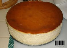 a cheesecake sitting on top of a white counter