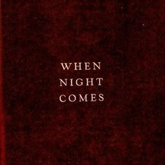 a red book with the words when night comes