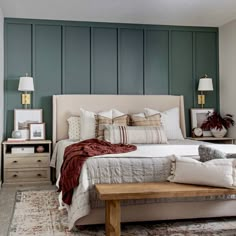 a large bed sitting in a bedroom on top of a wooden table next to a dresser