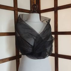 Stole, cloud, organza, black, shoulder cover, 120x 70cm, new Measure your shoulder circumference, 120cm minimum, otherwise the stole may slip when you wear it tied in the front. On the other hand, you can wear it tighter in a wrap version tied at the back. The ribbons measure approximately 40 cm each. Available in green/gold and pink/gold, white or ivory, or any other color on request. Sheer Shawl For Evening, Fitted Black Shawl For Party, Formal Fitted Black Shawl, Black Party Shawl, Fitted Black Shawl For Wedding, Sheer Organza Veil For Party, Sheer Organza Party Veil, Shawl Weddimg White Silk Organza Shoulder, Elegant Black One-size Shawl