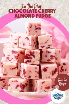 the pink chocolate cherry almond fudge is stacked on top of each other