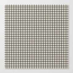 a black and white grid pattern on a wall