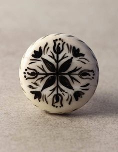 a black and white object sitting on top of a table