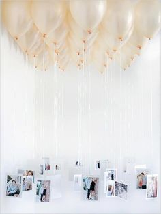 an instagram page with balloons and photos hanging from the ceiling, which are attached to strings