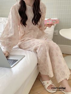 Wrap yourself in comfort and style with our Soft Floral Pink Pajama Dress Set. This charming ensemble is designed to elevate your bedtime routine with its combination of softness and sophistication.Crafted from luxurious fabric, the pajama dress offers a gentle embrace, ensuring a cozy and relaxing experience throughout the night. The delicate floral pattern adds a touch of elegance, making it perfect for lounging or enjoying a peaceful night's sleep. Features: 100% Washed Cotton Relax Fit (stre Night Pajamas Aesthetic, Aesthetic Pajamas, Aesthetic Korean Fashion, Casual Home Outfits, Korean Pajamas, Pink Loungewear, Pink Pajama Pants, Pajamas Aesthetic, Cotton Night Dress