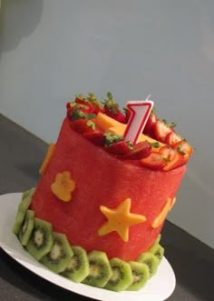 there is a cake made to look like it has fruit on top and stars around the edges