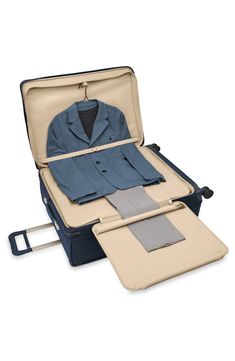 This extra-spacious suitcase designed for easy packing and easy transport features multiple compartments and pockets for all types of wardrobe items.Closure: The zip-around closure features self-repairing YKK zippers with lockable double pulls, and an included TSA cable combination lock keeps your possessions extra secure.Exterior features: The ballistic nylon exterior resists wear, moisture, dirt and abrasion, and proprietary shock-absorbing spinner wheels offer 360-degree movement and quiet gl Cheap Luggage With Multiple Compartments For Weekend Trips, Luxury Single Compartment Satchel Box Bag, Cheap Travel Cases With Luggage Sleeve, Cheap Functional Luggage With Zipper Closure, Cheap Everyday Use Luggage With Zipper Closure, Cheap Practical Travel Luggage, Luxury Designer Weekender Bag With Luggage Sleeve, Cheap Large Capacity Travel Accessories For Everyday Use, Cheap Travel Accessories With Multiple Compartments For Everyday Use