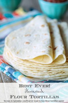 a stack of tortillas sitting on top of a table