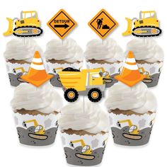 cupcakes with construction vehicles on them are arranged in the shape of an image