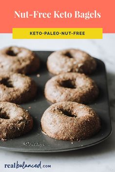 keto - palen bagels on a baking tray with text overlay that reads, nut - free keto bagels