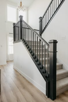 a black and white staircase in a house